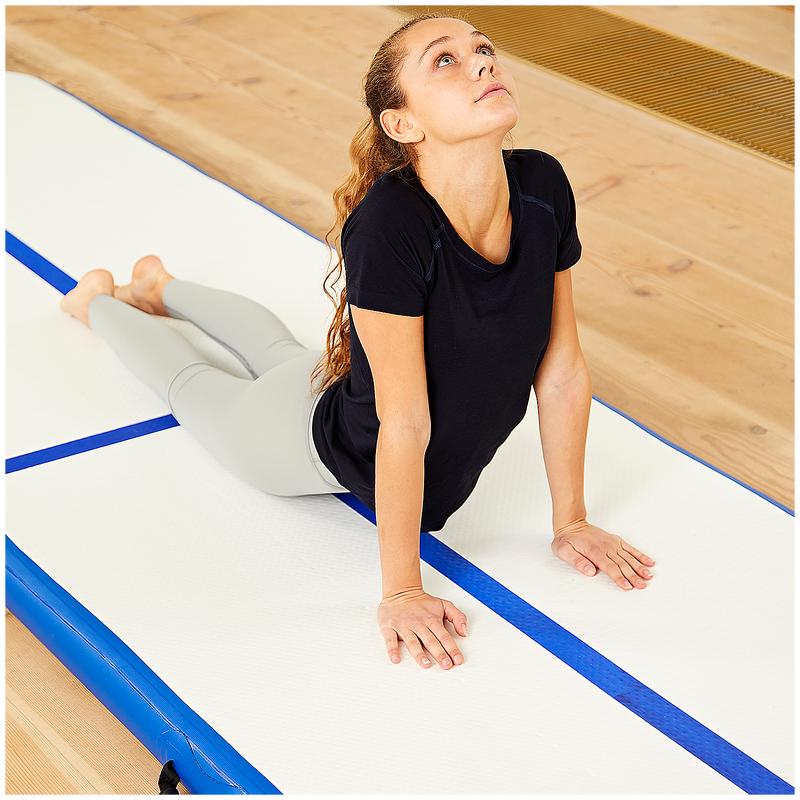 Performing exercises on the airtrack gymnastics mat