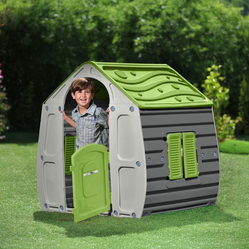 Magical green/grey playhouse for children in the garden