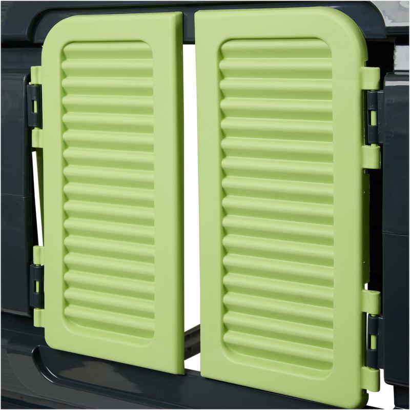 Close-up of window of magical green/grey playhouse for children 