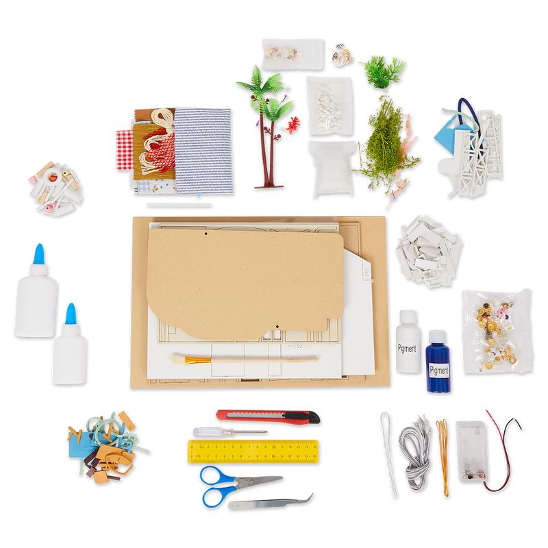 Différents accessoires et outils pour construire la maison miniature