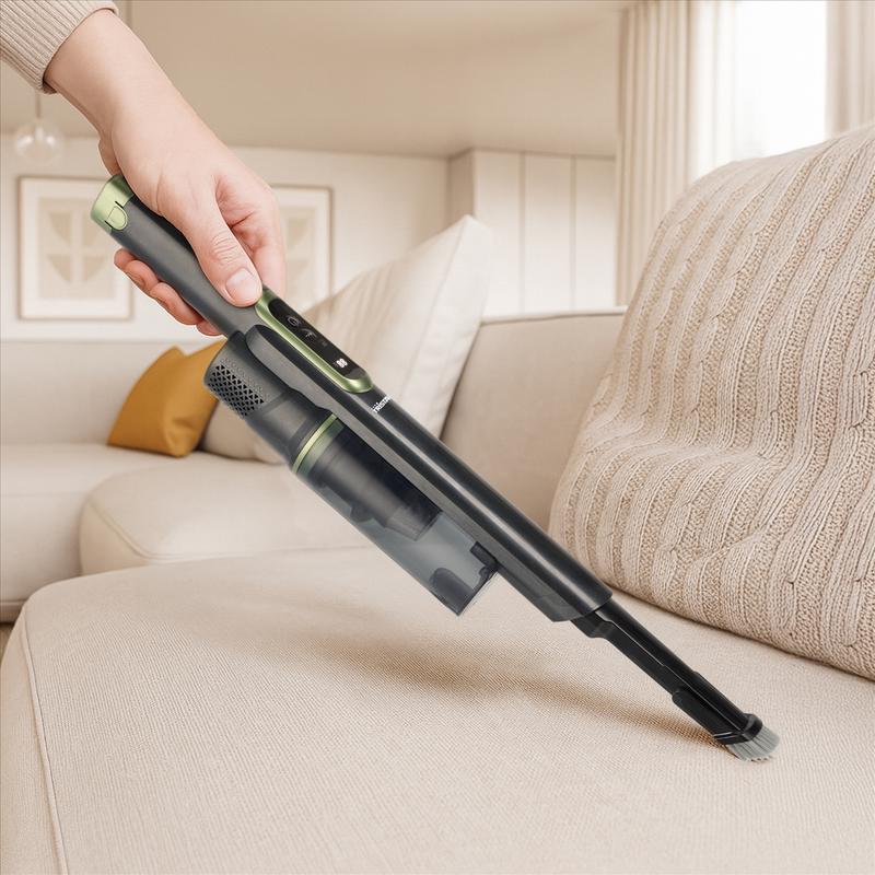 Tristar cordless vacuum cleaner with charging station - vacuuming couch