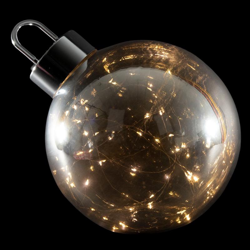 Lampe d'ambiance en forme de boule de Noël allumée