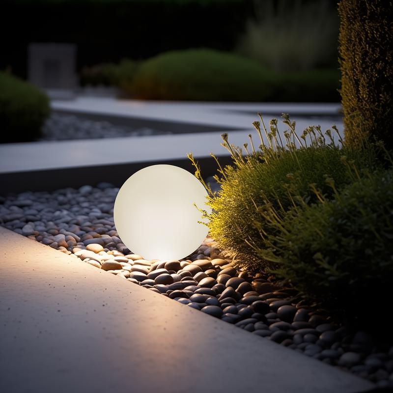 Led vloerlamp voor buiten - bol in de tuin