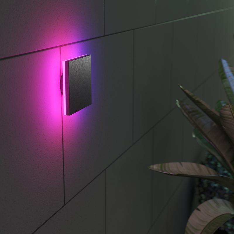 LSC Smart Connect outdoor wall lamp on the wall with purple light