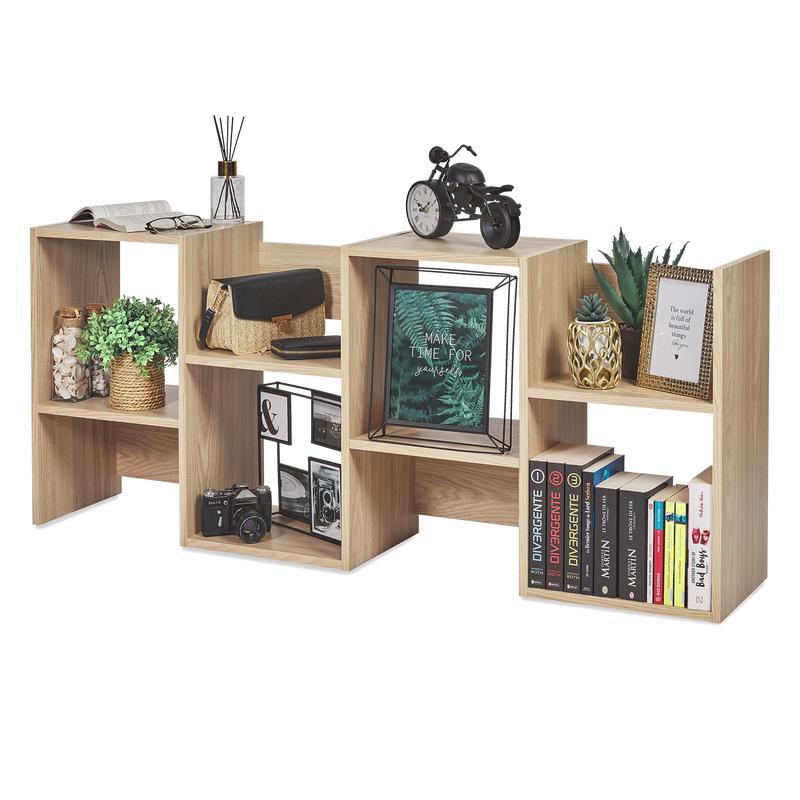 Horizontal light brown shelves with books and stuff