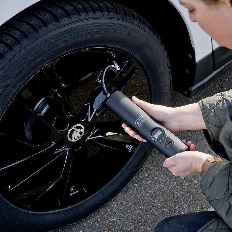 Inflating car tyres with cordless air compressor