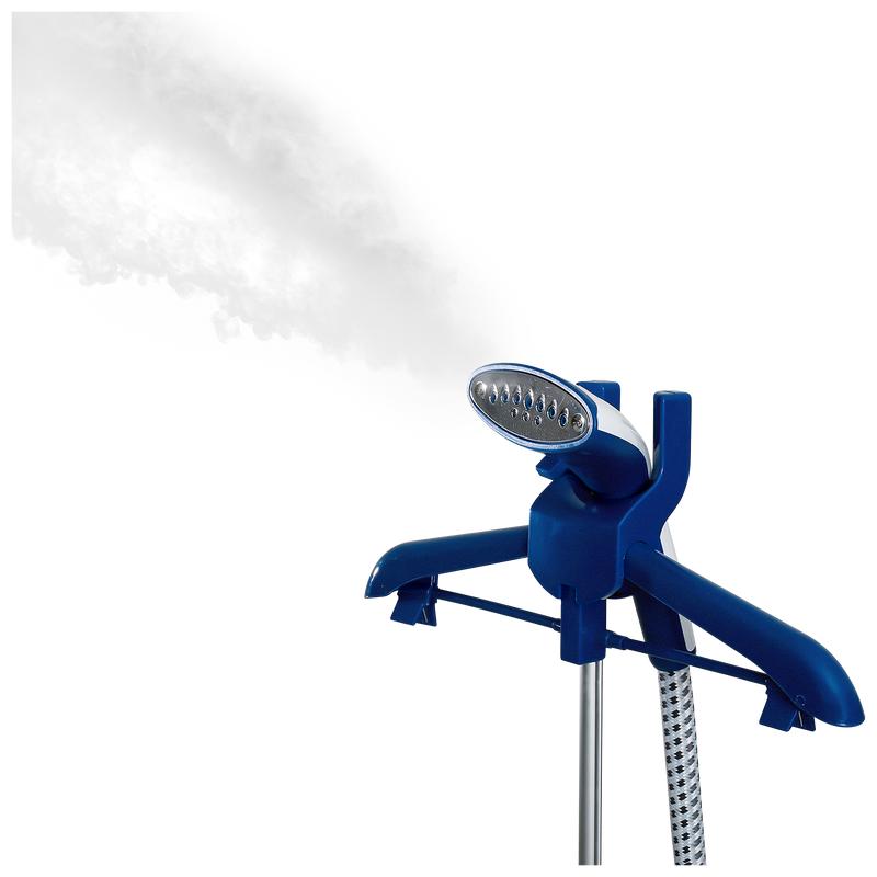 Clothing and fabric steamer with steam coming out