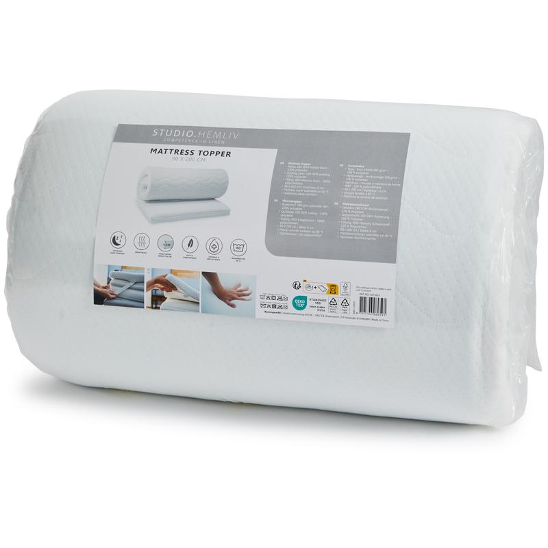 Memory foam mattress topper packaged