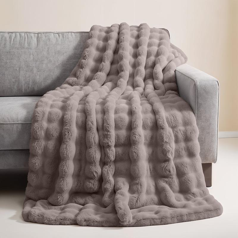 Pompom Fur throw with cushions – taupe – plaid on couch