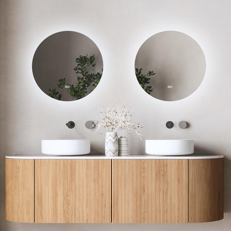 Bathroom mirror with LED lighting above double basin