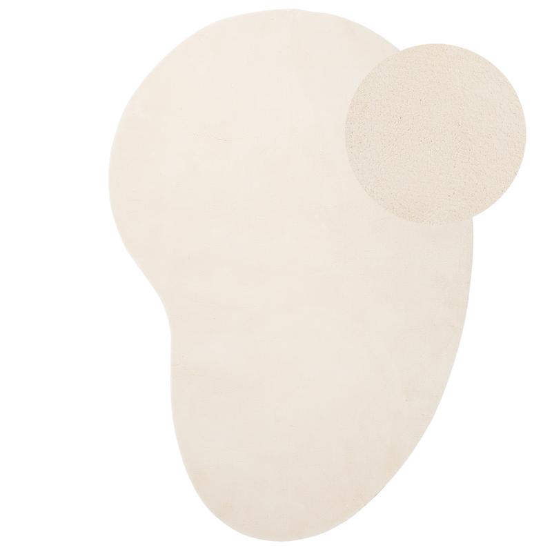 Tapis asymétrique crème isolant