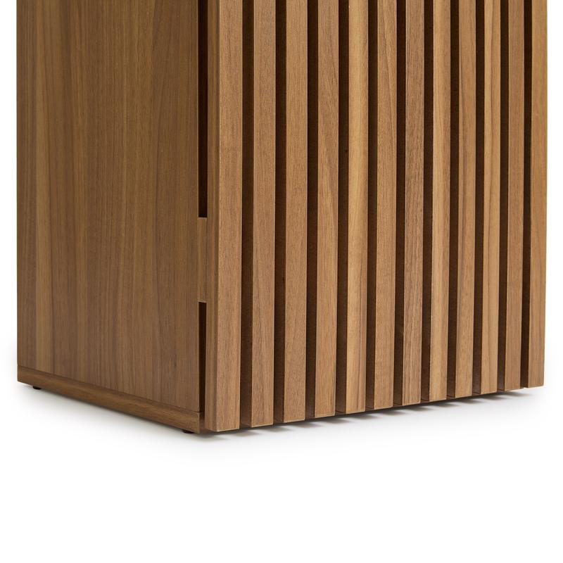 Bathroom cabinet with slats in wood colour close-up of bottom of cabinet