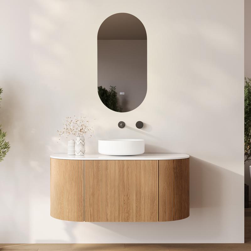 Oval bathroom mirror with LED lighting in the bathroom