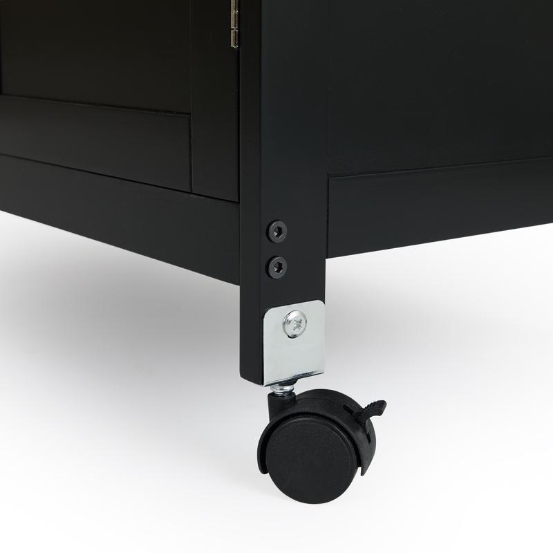 Kitchen trolley black on wheels - close-up of wheel