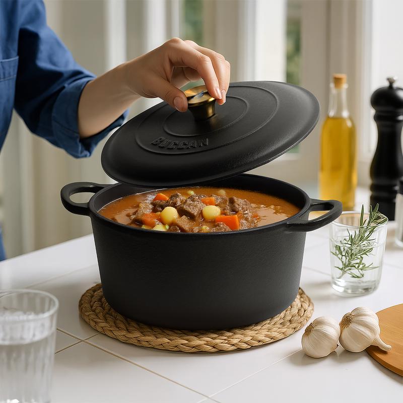 Cast iron casserole with lid - on table