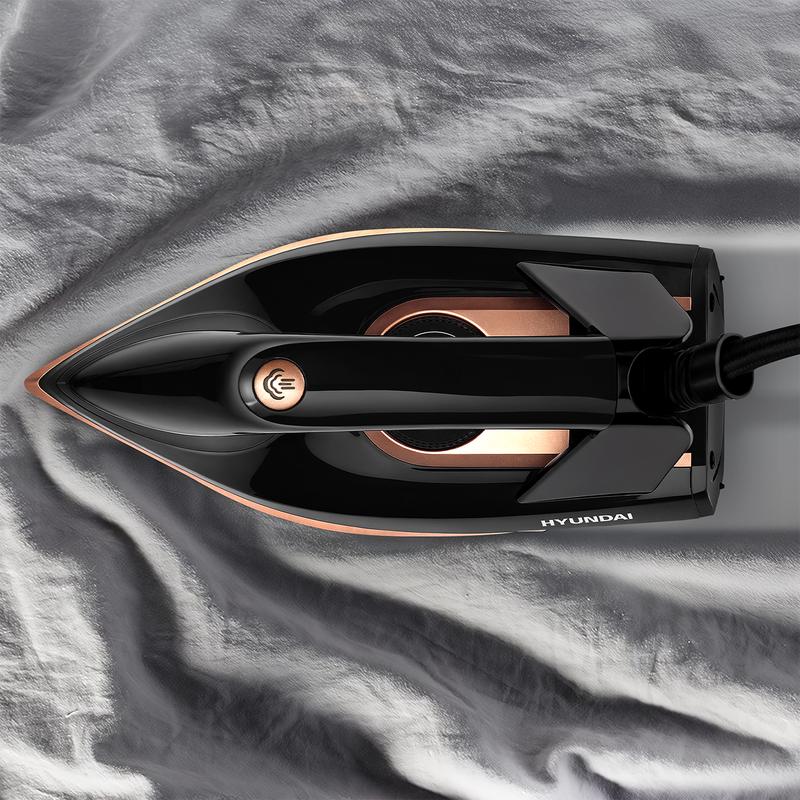 Hyundai steam iron in use viewed from above
