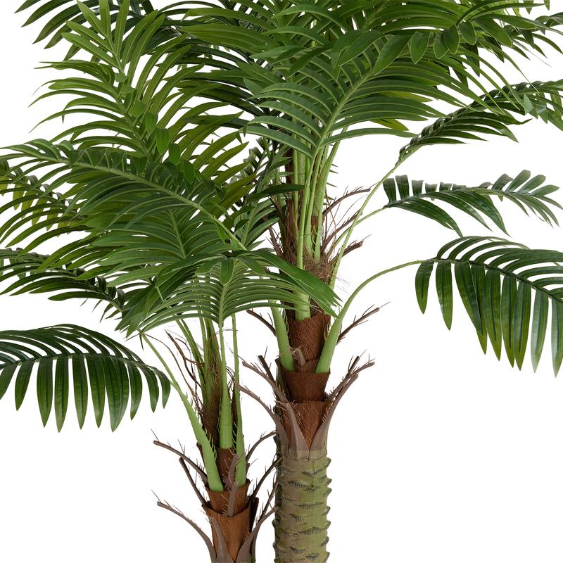 Artificial palm with trunks at varying heights