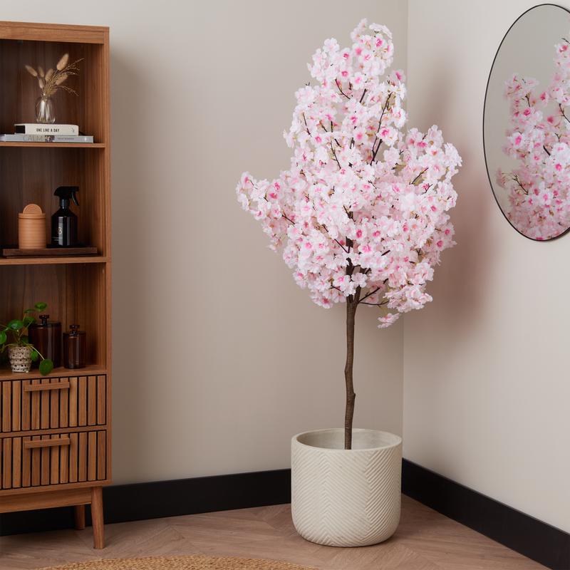Artificial cherry blossom tree in beige pot - lifestyle image
