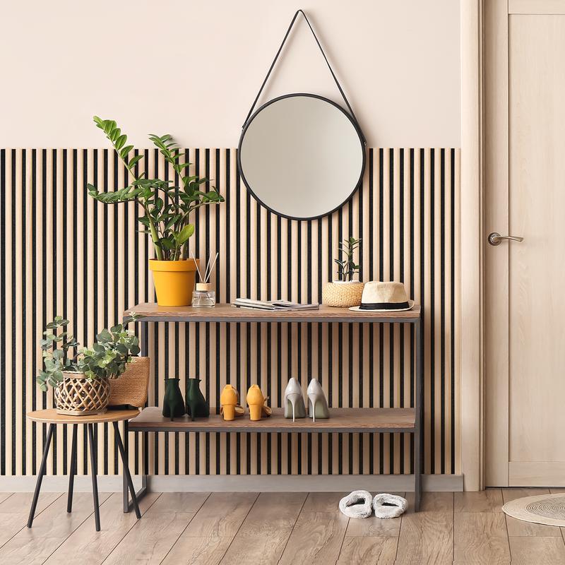 Acoustic wall panels with semi-circular slats - light oak - in hallway